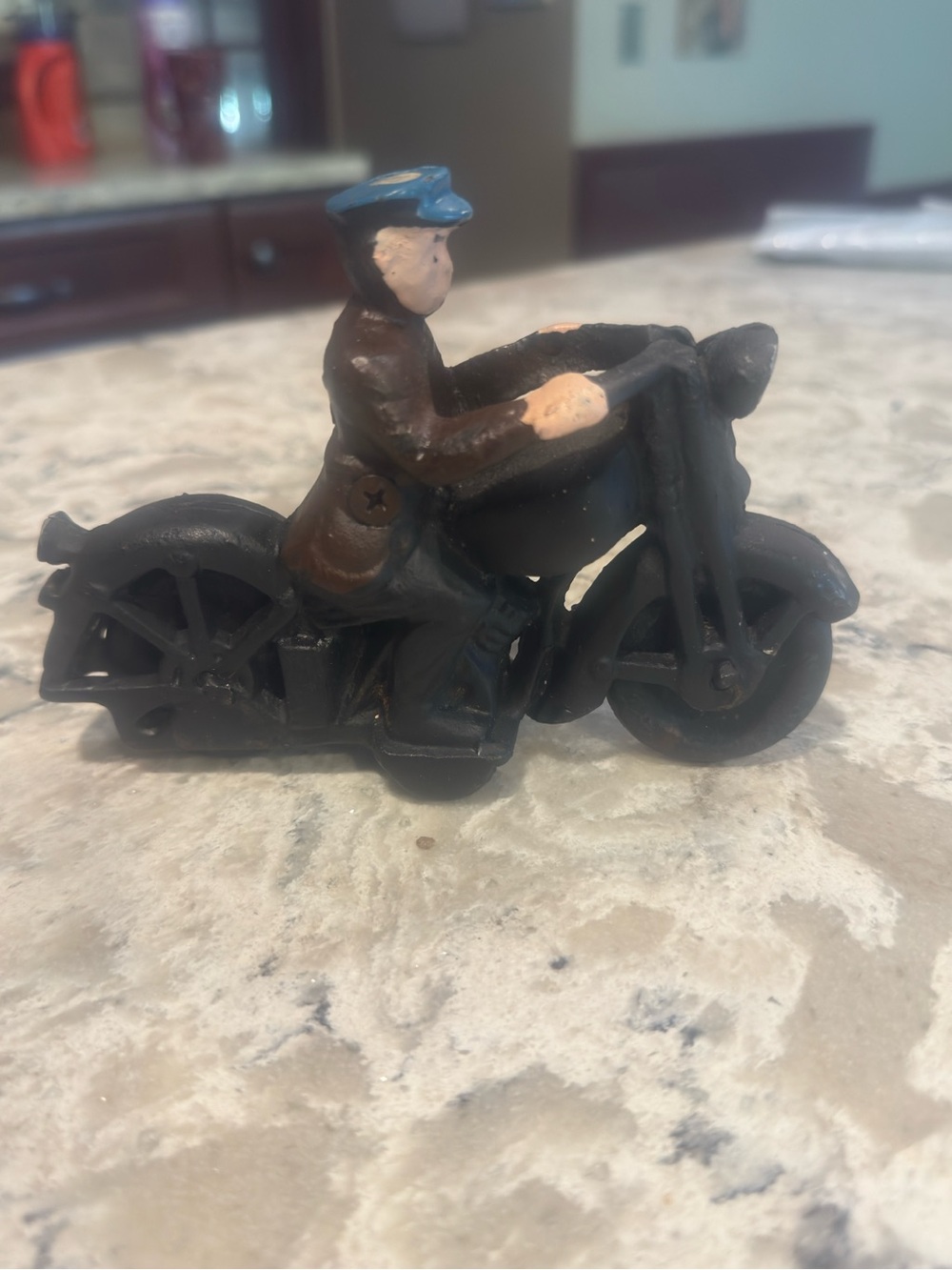 Vintage Cast Iron Motorcyclist Figurine - Black & Brown with Blue Cap 6 inches